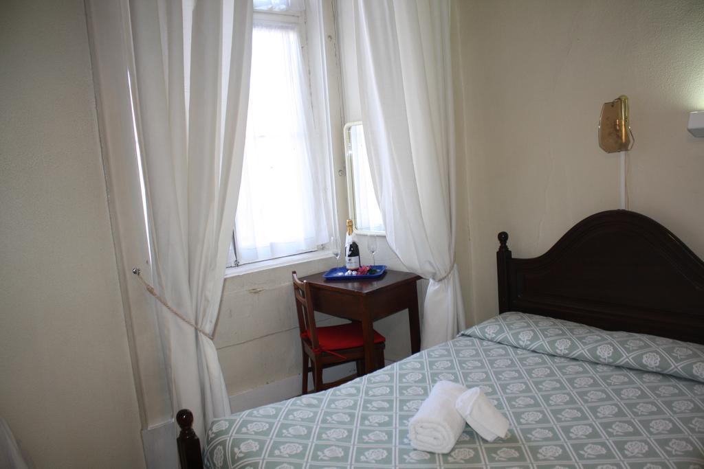 Pensao Residencial Estrela Do Mondego Hotel Lisboa Стая снимка