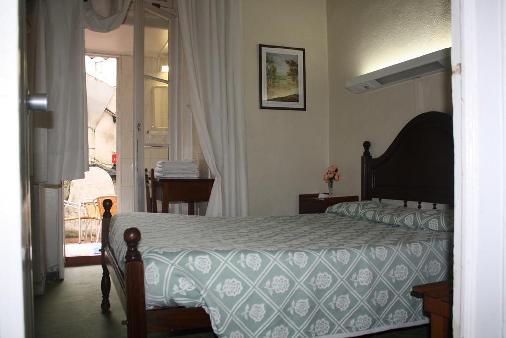 Pensao Residencial Estrela Do Mondego Hotel Lisboa Стая снимка