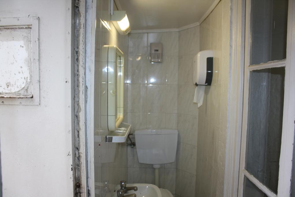 Pensao Residencial Estrela Do Mondego Hotel Lisboa Стая снимка